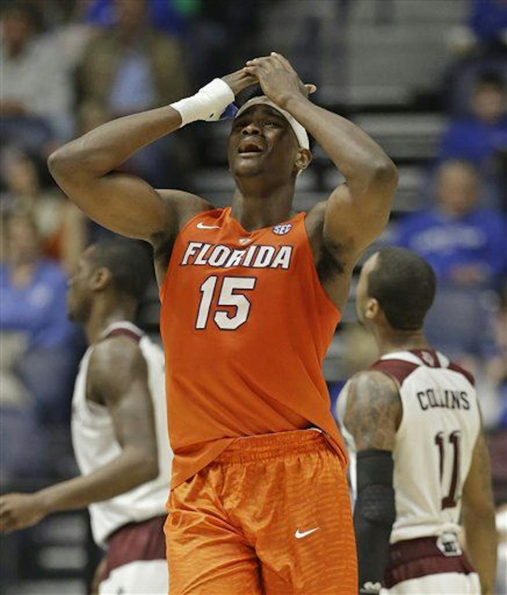 <p>Florida's John Egbunu (15) reacts after drawing his fifth foul during the second half of an NCAA college basketball game against Florida in the Southeastern Conference tournament in Nashville, Tenn., Friday, March 11, 2016. (AP Photo/Mark Humphrey)</p>