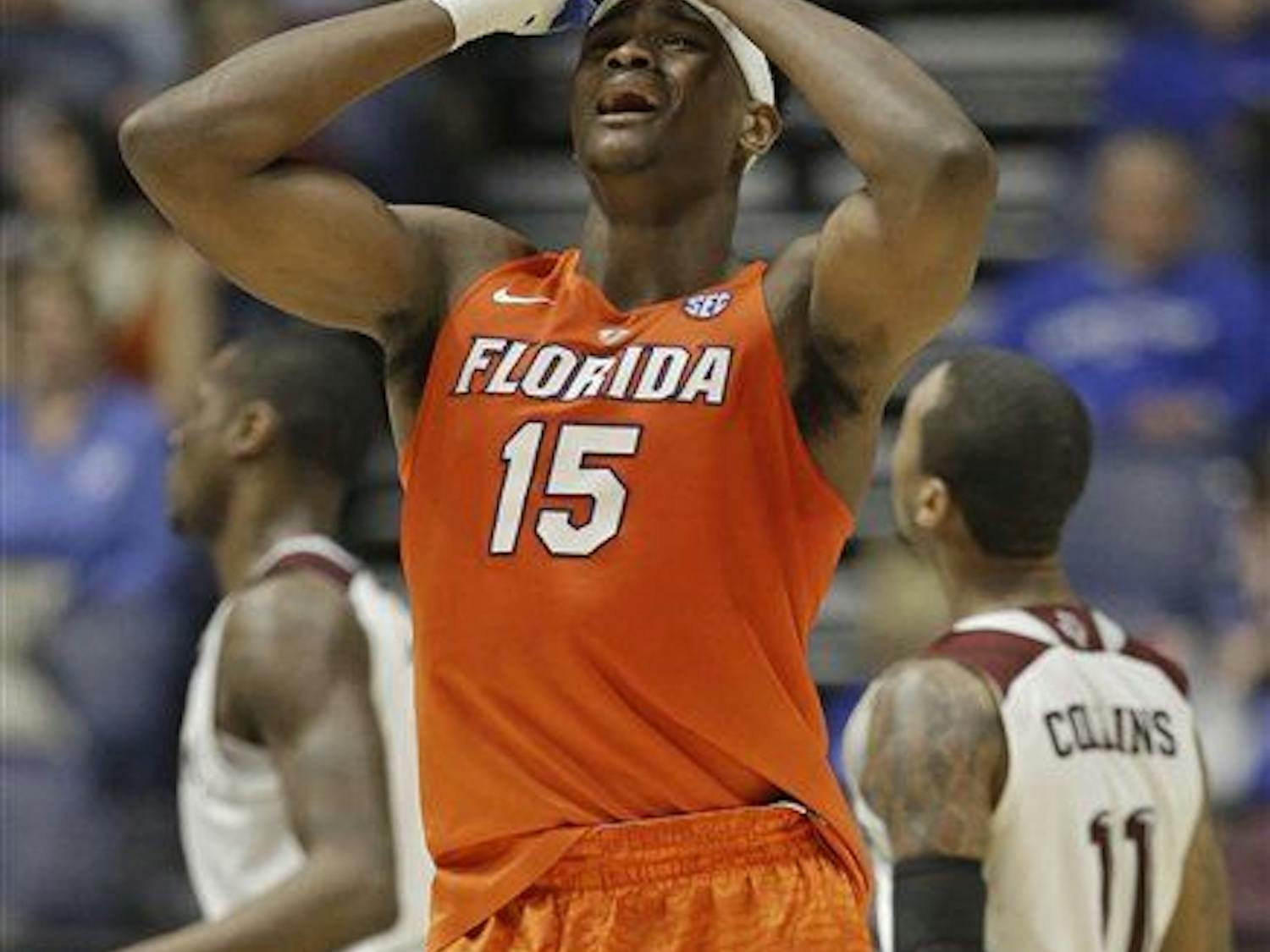 Florida's John Egbunu (15) reacts after drawing his fifth foul during the second half of an NCAA college basketball game against Florida in the Southeastern Conference tournament in Nashville, Tenn., Friday, March 11, 2016. (AP Photo/Mark Humphrey)