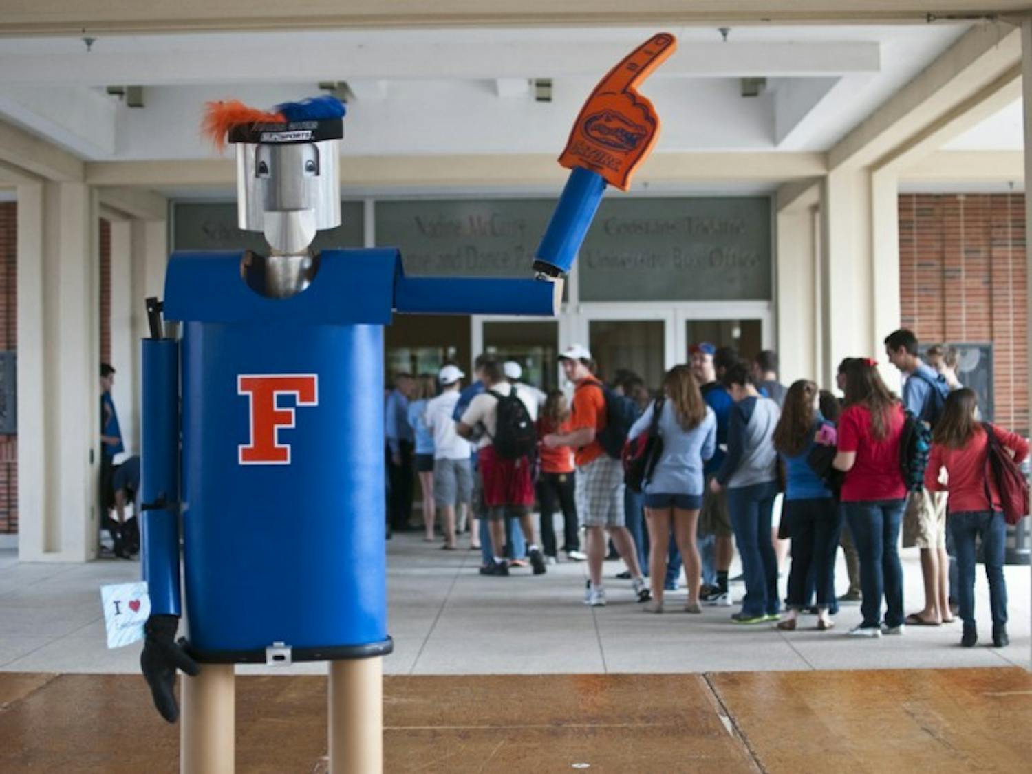 A 7-foot robot named Otto built by the Gator Robotics club stands on display on the Colonnade last Wednesday. The robot is a replica of the original bot, which was built in 1957 by an electrical engineering student from UF.