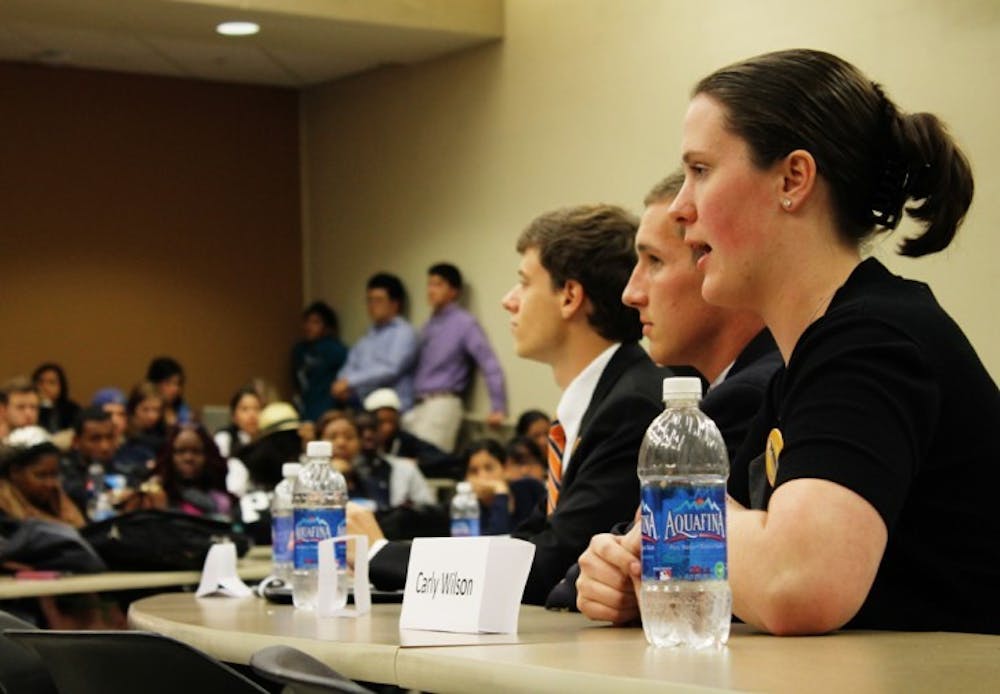 <p>Sen. Carly Wilson, Students Party treasurer candidate, speaks at the third annual Asian American Student Union Student Government Debate on Monday night.</p>