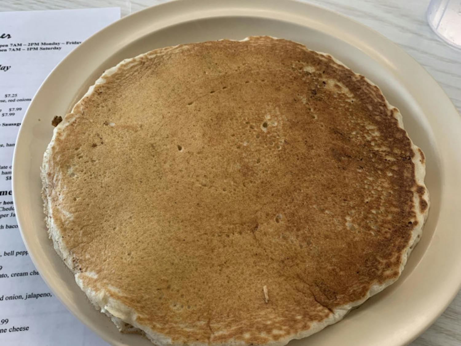 Traditional 16th Avenue Diner sells warm, buttery pancakes with a dash of cinnamon.&nbsp;