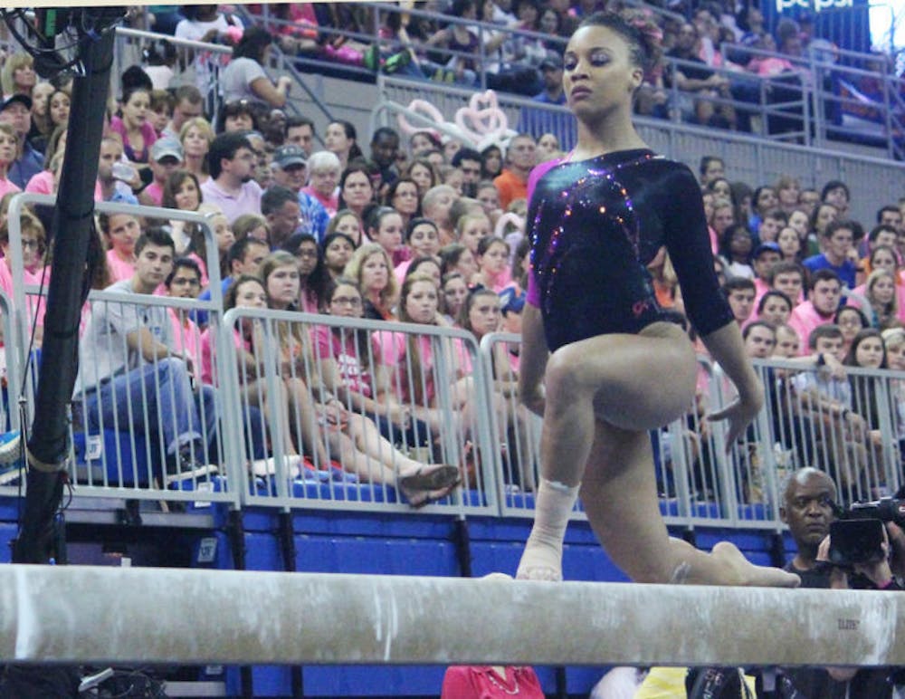 <p>Kytra Hunter performs a balance beam routine during Florida’s 198.125-197.625 win against LSU on Feb. 21 in the O’Connell Center. Hunter and the Gators begin competing at the NCAA Championships on April 18.</p>