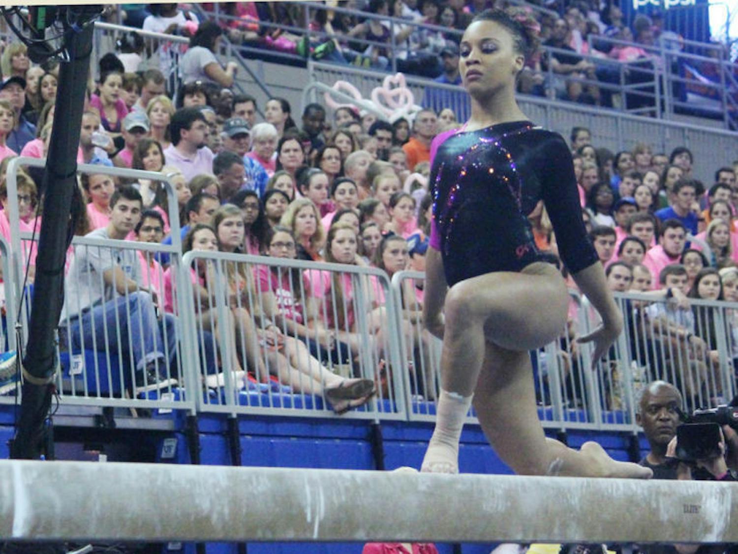 Kytra Hunter performs a balance beam routine during Florida’s 198.125-197.625 win against LSU on Feb. 21 in the O’Connell Center. Hunter and the Gators begin competing at the NCAA Championships on April 18.