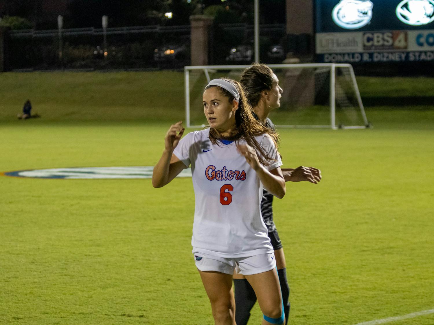 Defender Kit Loferski (6) drew a penalty kick in the seventh minute of Florida’s 3-1 win over Texas A&amp;M Sunday night. Midfielder Madison Alexander buried the shot to get the Gators on the board first.