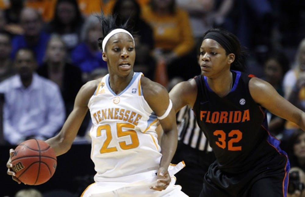 <p>&nbsp;Florida forward Jennifer George (32) recorded her SEC-leading 14th double-double in Sunday’s 75-59 loss to Tennessee, but it wasn’t enough as Vols forward Glory Johnson (25) scored 21 to propel UT.</p>
