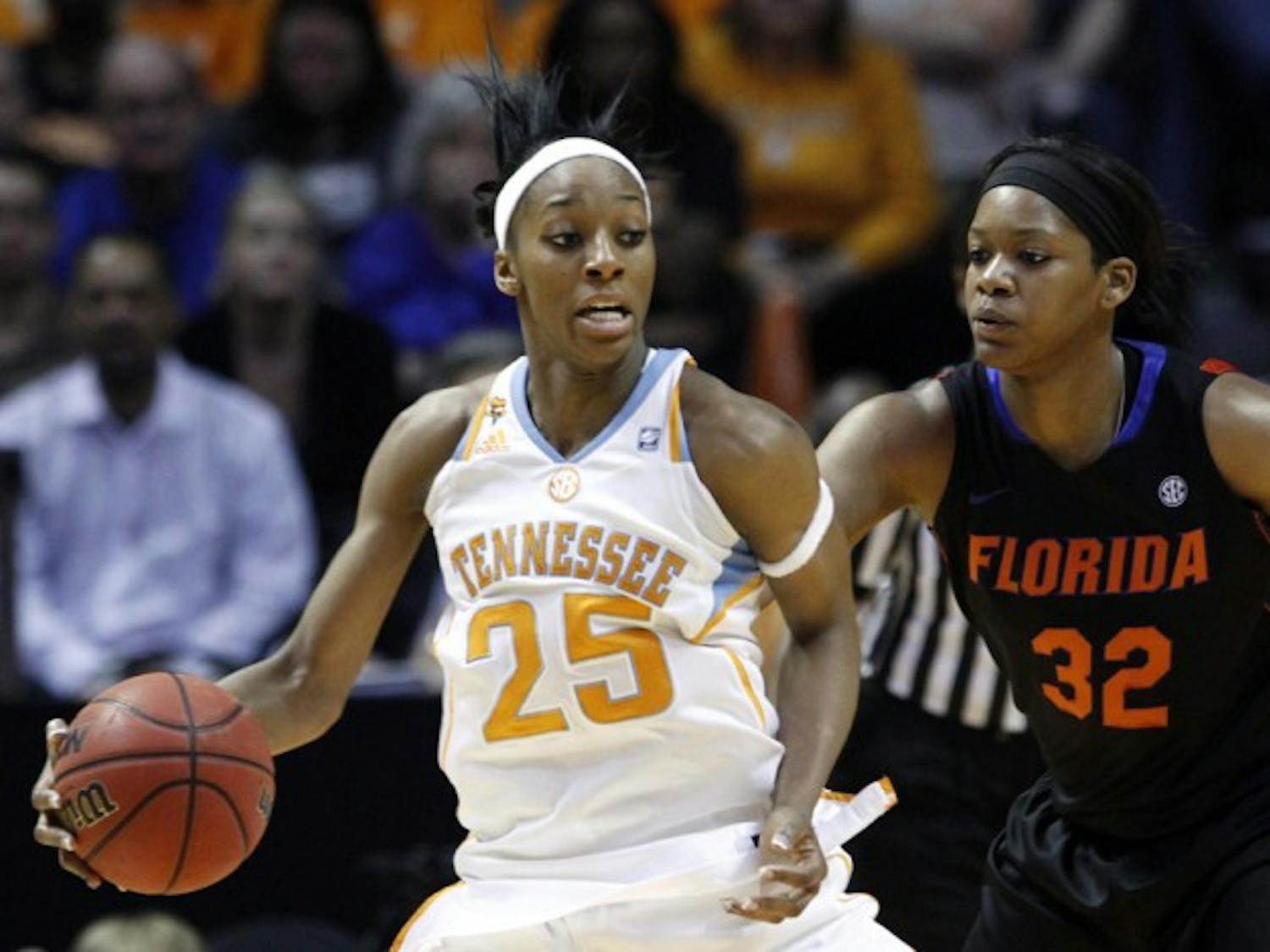 &nbsp;Florida forward Jennifer George (32) recorded her SEC-leading 14th double-double in Sunday’s 75-59 loss to Tennessee, but it wasn’t enough as Vols forward Glory Johnson (25) scored 21 to propel UT.