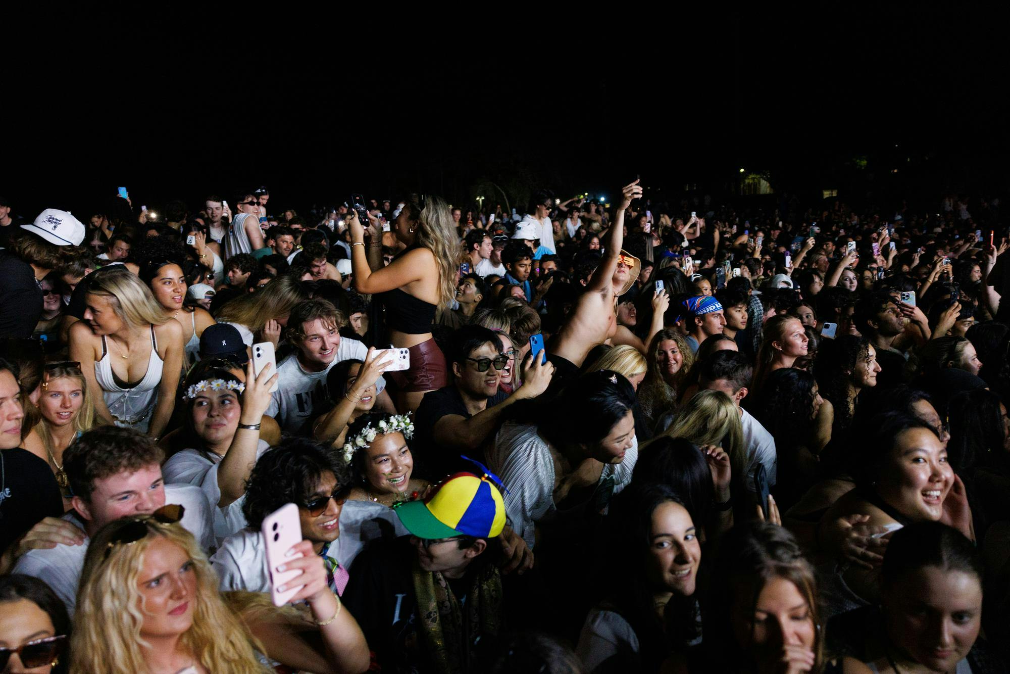 University of Florida students dance while The Chainsmokers perform during SwampFest at Flavet Field, Tuesday, April 14, 2026, in Gainesville, Fla.