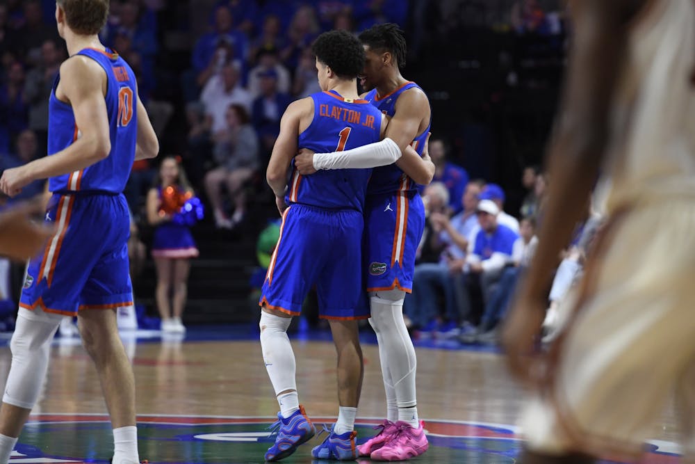 <p>UF basketball players Walter Clayton Jr. (1) and Will Richard (5) embrace during the game against the Texas Longhorns on Saturday, January 18, 2025, at the O’Connell Center in Gainesville, Florida.</p>