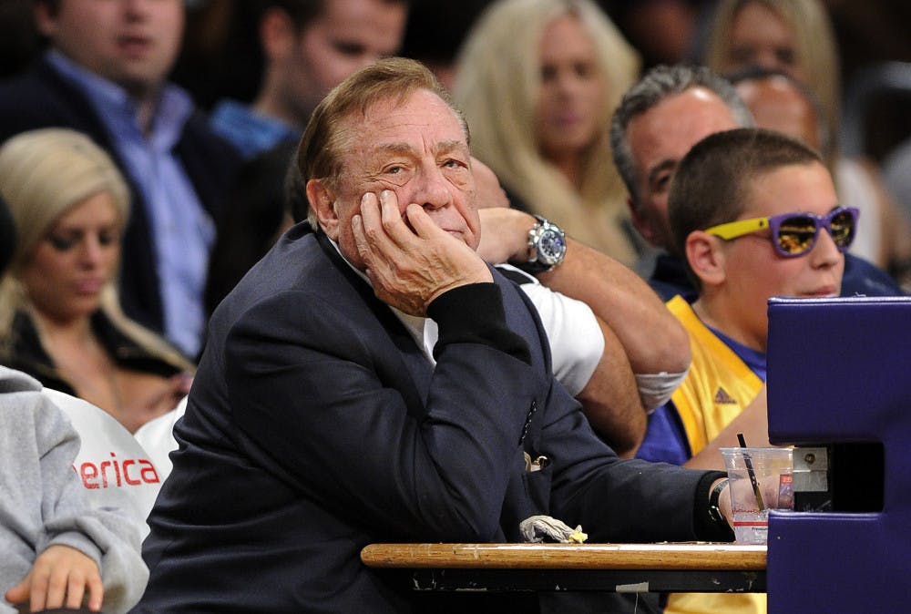 <p>Los Angeles Clippers owner Donald Sterling looks on during the first half of their NBA basketball game against the Los Angeles Lakers on Feb. 25, 2011, in Los Angeles. NBA Commissioner Adam Silver has banned Sterling for life and fined him $2.5 million for making racist comments.</p>