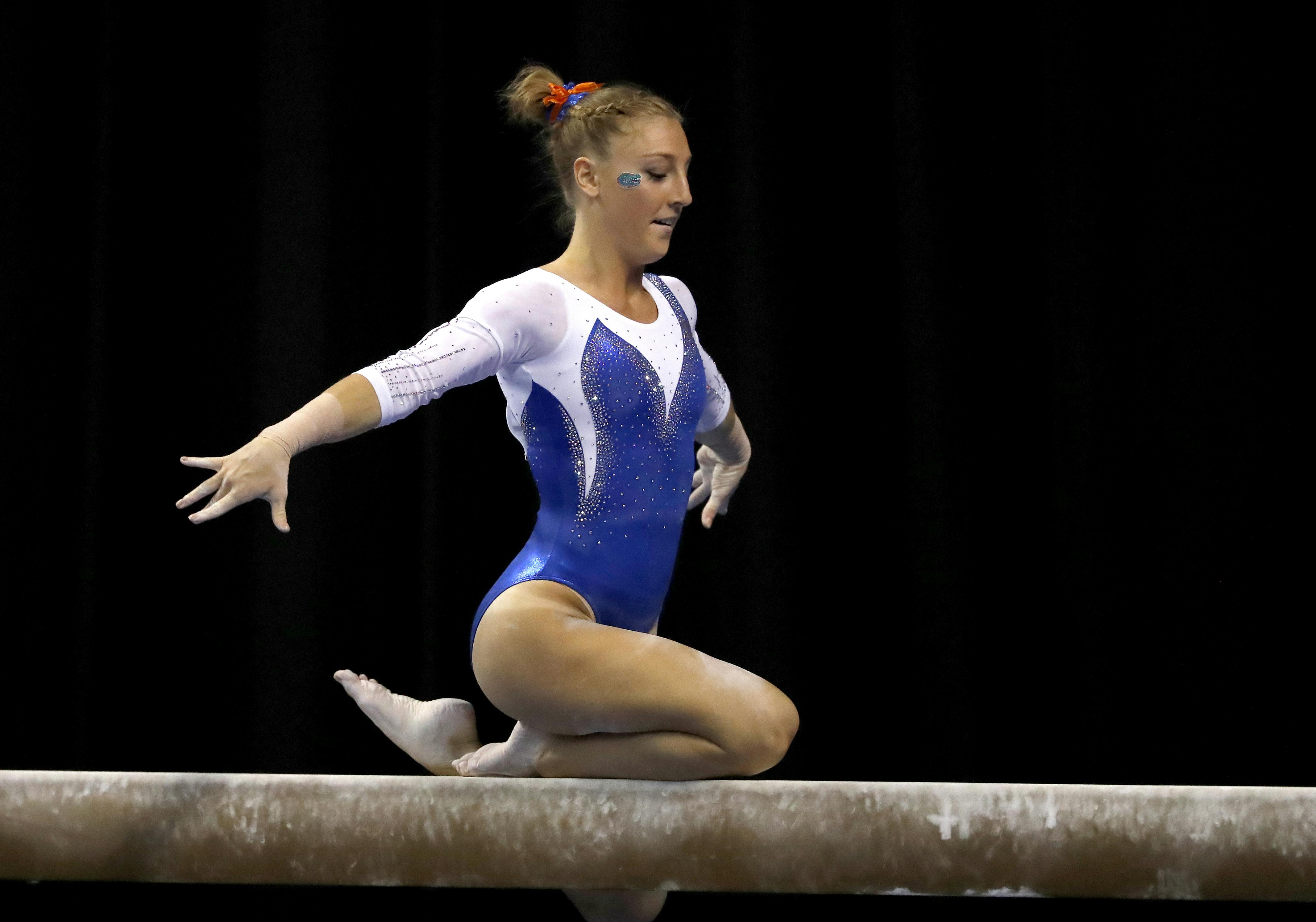 Florida's Alex McMurtry competes on the balance beam during the NCAA college women's gymnastics championships, Saturday, April 15, 2017, in St. Louis. (AP Photo/Jeff Roberson)