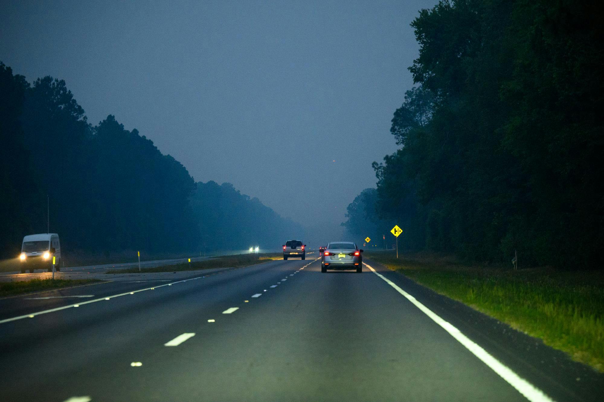 Northbound on US-441 smokefilled during a mandatory fire evacuation on Florida State Route 121, Sunday, April 19, 2026, in Gainesville, Florida.