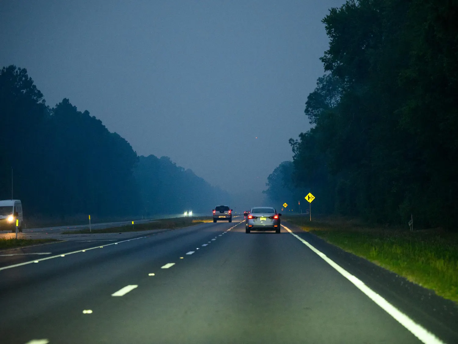 Northbound on US-441 smokefilled during a mandatory fire evacuation on Florida State Route 121, Sunday, April 19, 2026, in Gainesville, Florida.