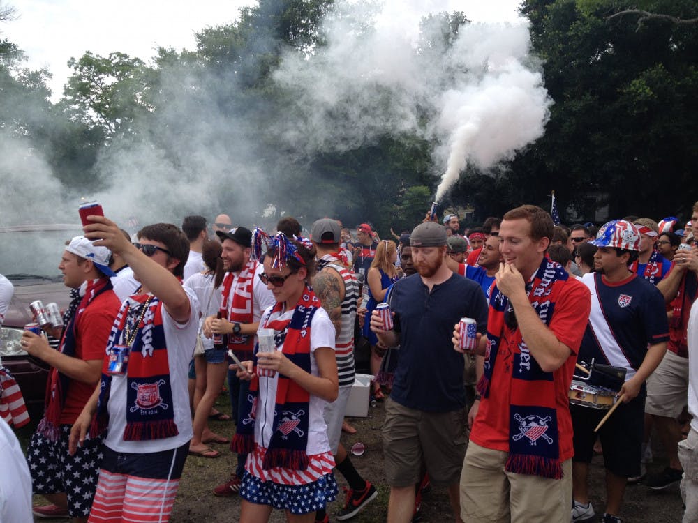 Members of the American Outlaws supporters group and other U.S. soccer fans prepare to march to EverBank Field to watch the men’s national team defeat Nigeria 2-1 in its final send-off game before the World Cup. The U.S. will open the World Cup against Ghana on Monday.