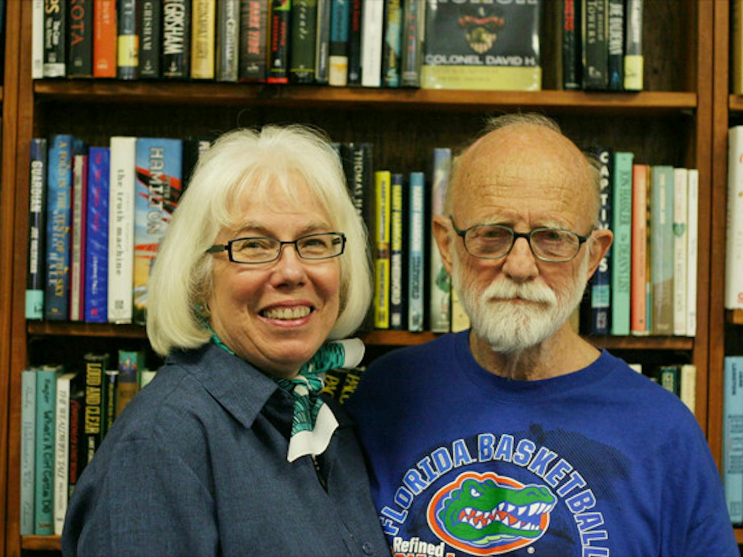 Book Lover's Cafe owners Anne Haisley, 71, and Phil Haisley, 77, pose for a photo Thursday. They have owned the Gainesville cafe, which will be closing its doors in January, since 1989.