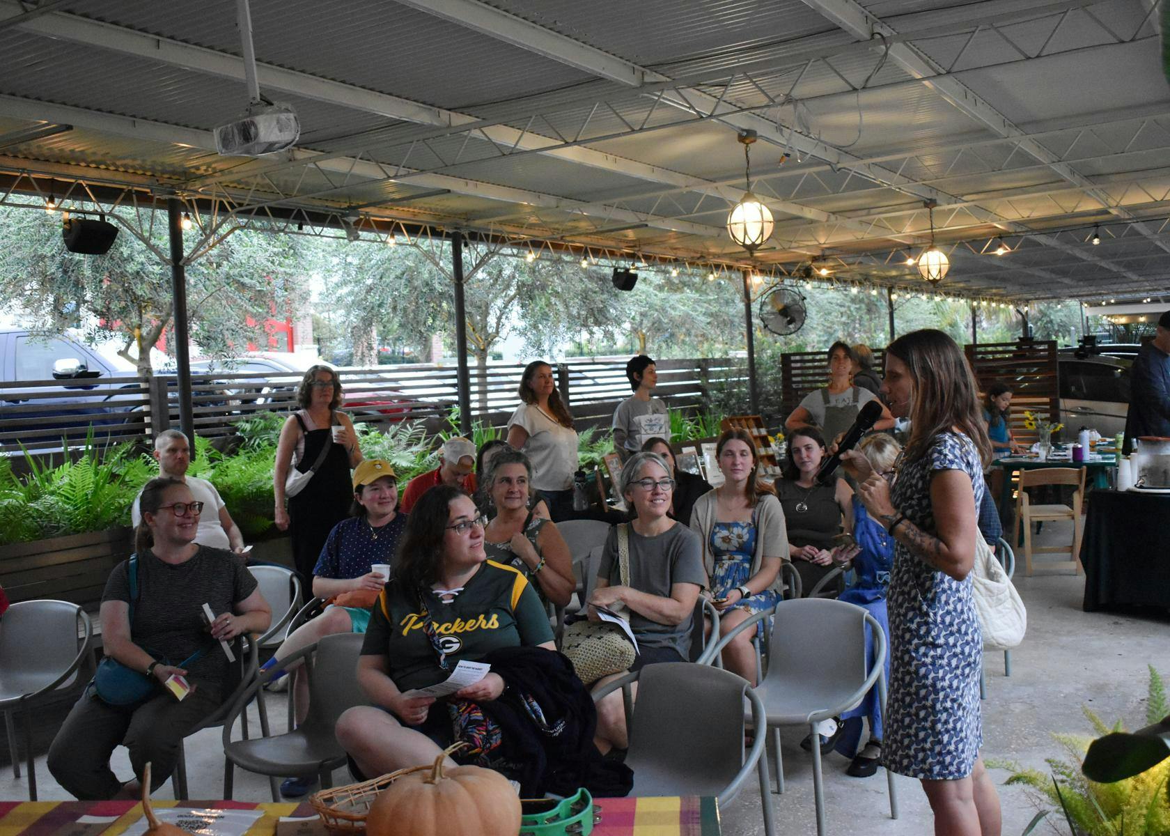 Melissa DeSa addresses the crowd at the Gainesville Reads Kickoff Celebration at the Lynx Bookstore, Friday, Oct. 3, 2026 in Gainesville, Fla.