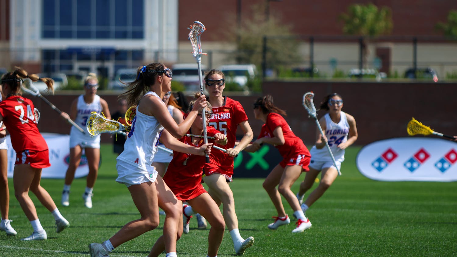 Florida attacker Danielle Pavinelli looks for a pass during the Gators' 14-13 loss to the No. 6 Maryland Terrapins Saturday, Feb. 25, 2023.