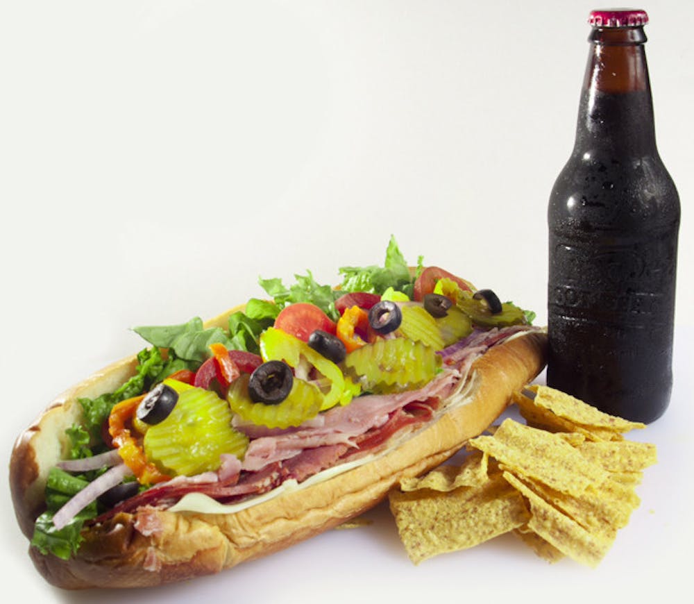 <p>"#1 Martian" sub pictured is made with provolone, ham, Capicola and prosciutto. Mars Pub and Laser Tag, 239 W. University Ave., recently began serving food.</p>