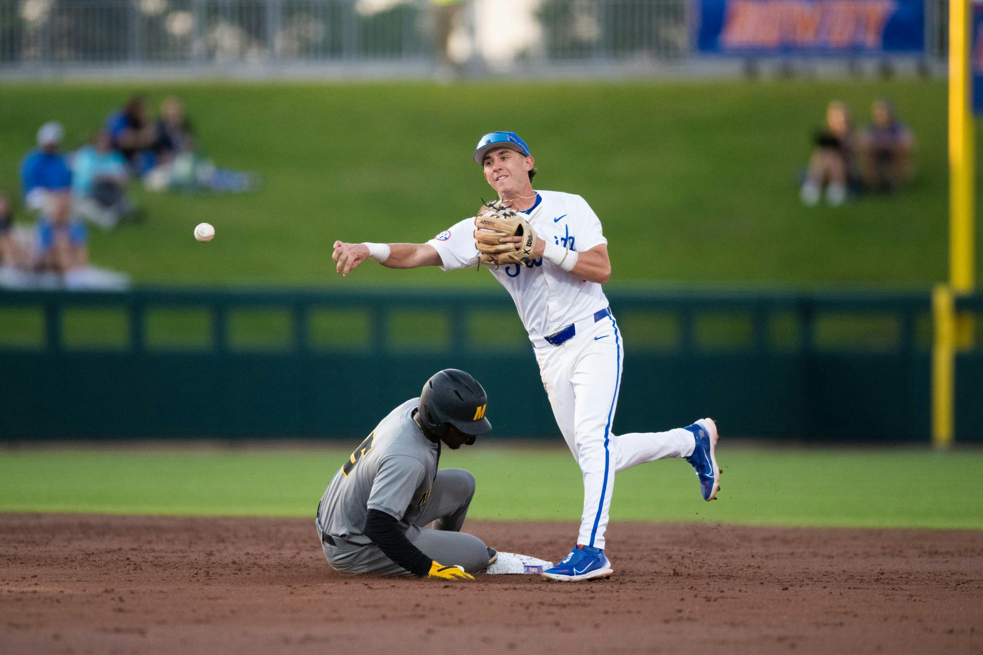 Florida Gators second basemen Justin Nadeau (1) throws to first in a baseball game against the Missouri Tigers on Thursday, April 10, 2025, in Gainesville, Fla.