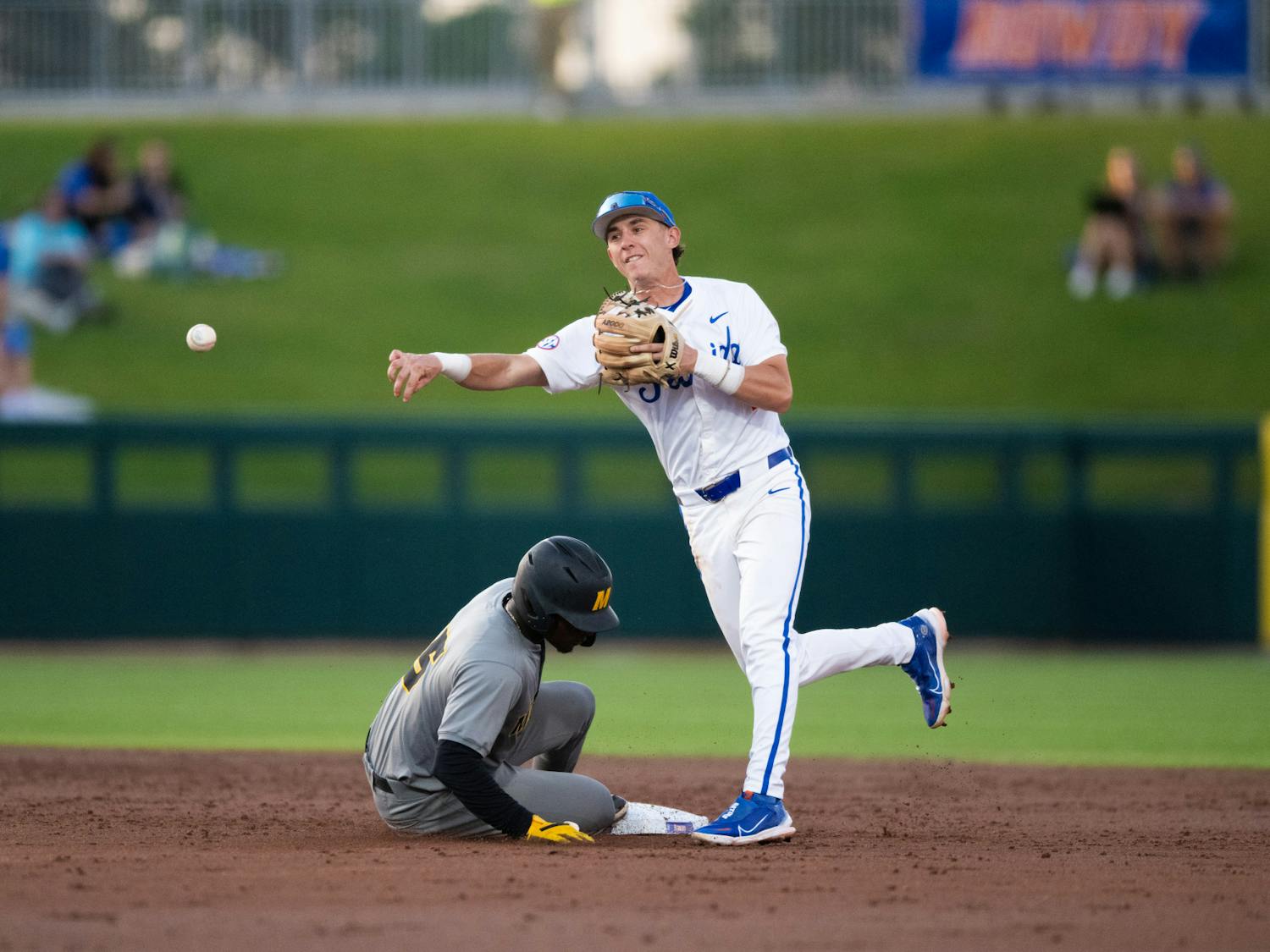 Florida Gators second basemen Justin Nadeau (1) throws to first in a baseball game against the Missouri Tigers on Thursday, April 10, 2025, in Gainesville, Fla.