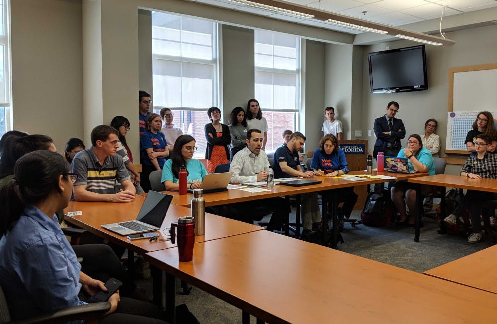 Members of Graduate Assistants United met with UF’s chief bargainer, Bill Connellan, over five months in 2019 to negotiate the terms of their contract. The agreement to waive transportation and health fees for graduate assistants was the first of its kind in Florida, said Stephen Phillips, the union’s spokesperson.