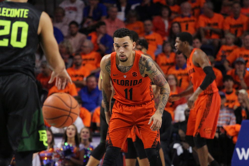<p>Guard Chris Chiozza was just one of two Gators to reach double figures in scoring against Georgia Tuesday night. He finished with 13 points and six assists. </p>
