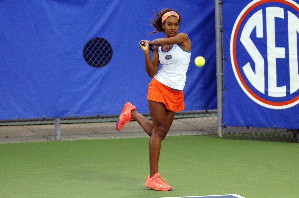 UF’s Brianna Morgan returns a serve during Florida’s win over USF on Jan. 27, 2016, at the Ring Tennis Complex.
