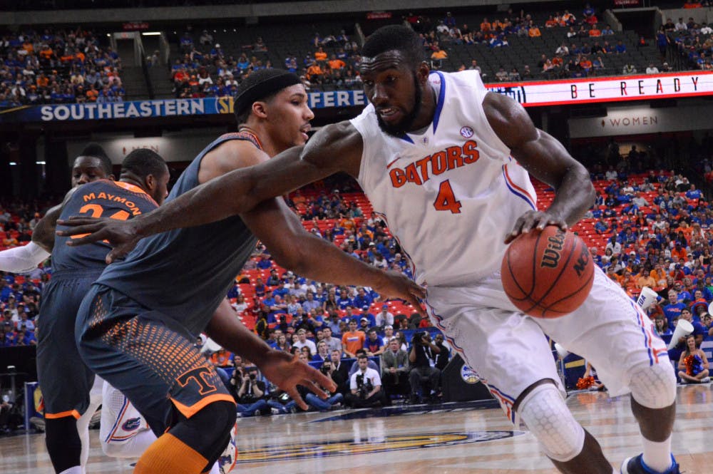 <p>Patric Young drives in the paint during Florida’s 56-49 win against Tennessee on March 15 in the Georgia Dome. </p>