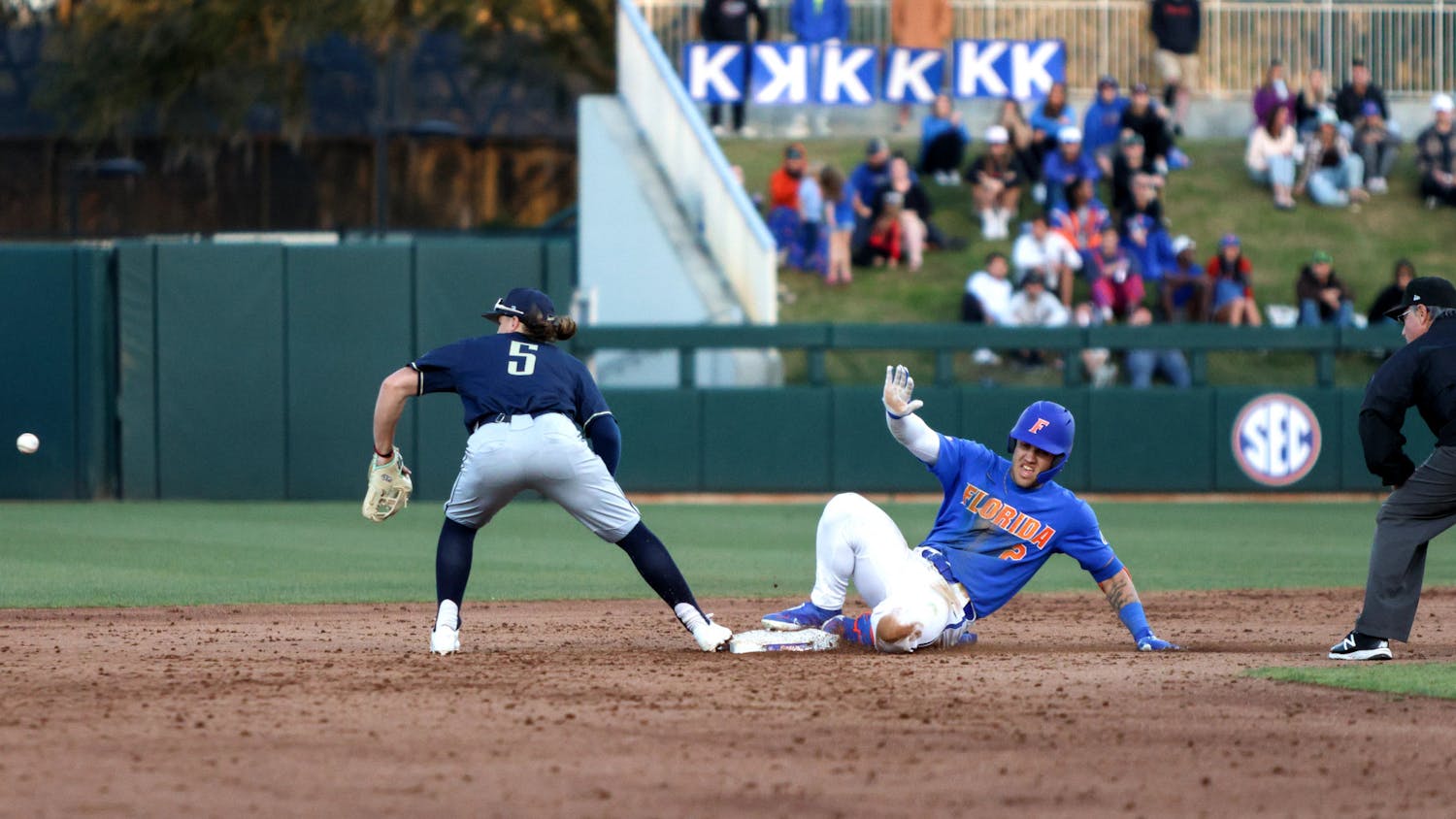Florida right fielder Ty Evans slides into second base in the Gators' 13-3 win against the Charleston Southern Buccaneers Friday, Feb. 17, 2023.