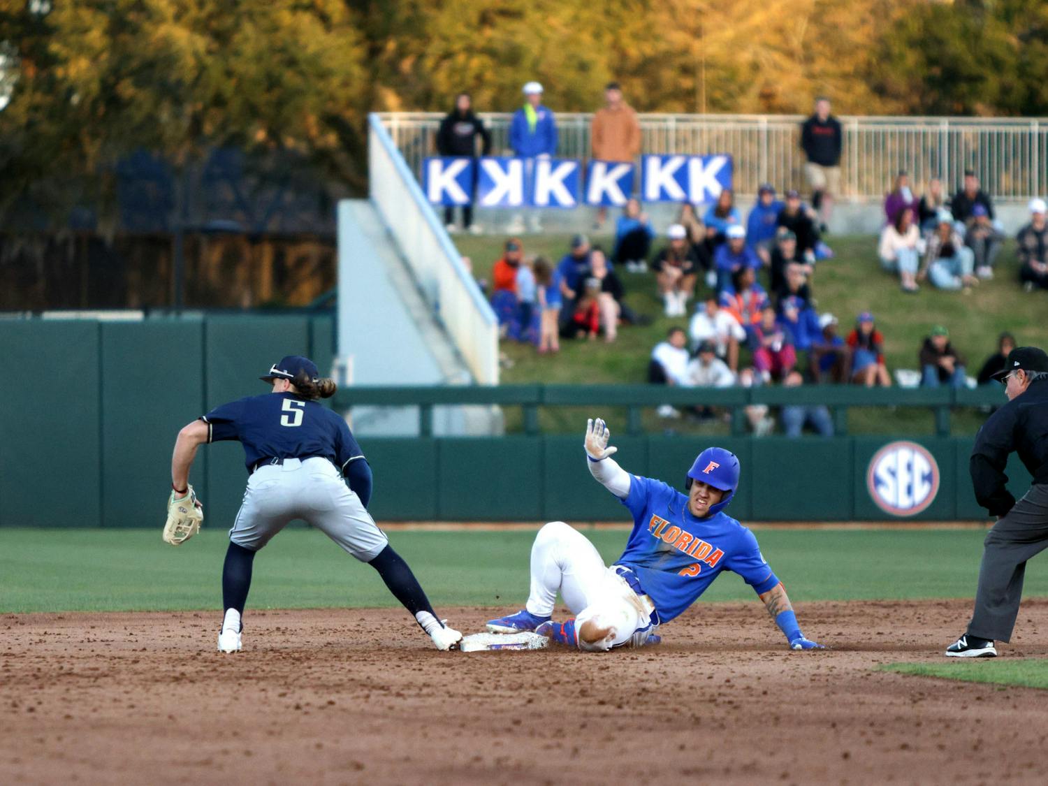 Florida right fielder Ty Evans slides into second base in the Gators' 13-3 win against the Charleston Southern Buccaneers Friday, Feb. 17, 2023.