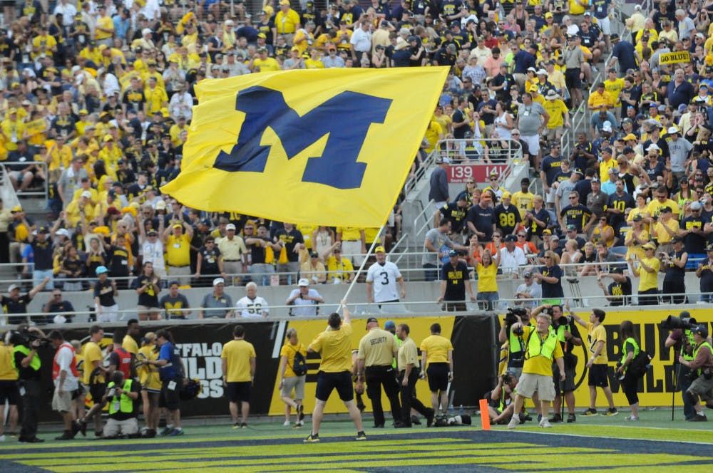 <p><span>Michigan fans celebrate after the Wolverines beat the Gators, 41-7, in the 2016 Citrus Bowl.</span></p>