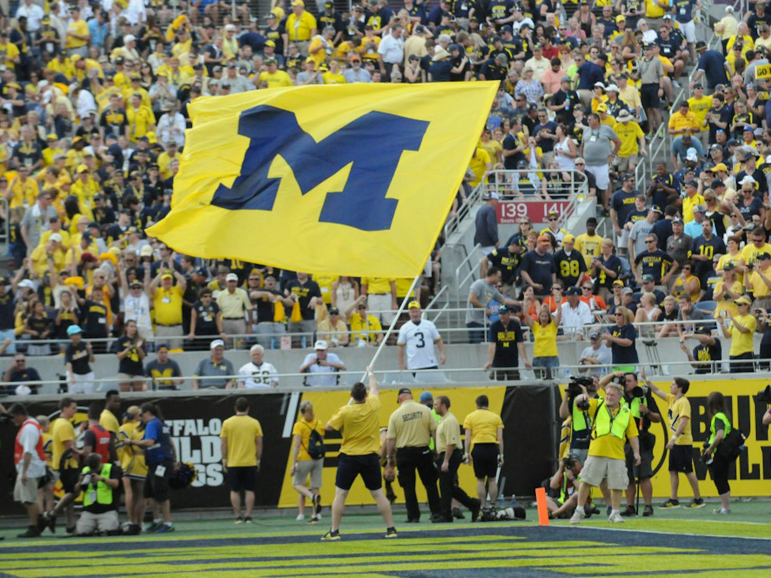 Michigan fans celebrate after the Wolverines beat the Gators, 41-7, in the 2016 Citrus Bowl.