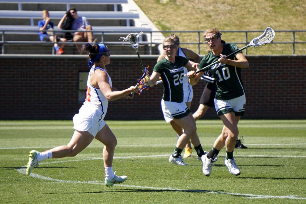 Caroline Fitzgerald runs toward the net during Florida's 16-6 win over Dartmouth on Feb. 27, 2016, at Donald R. Dizney Stadium.