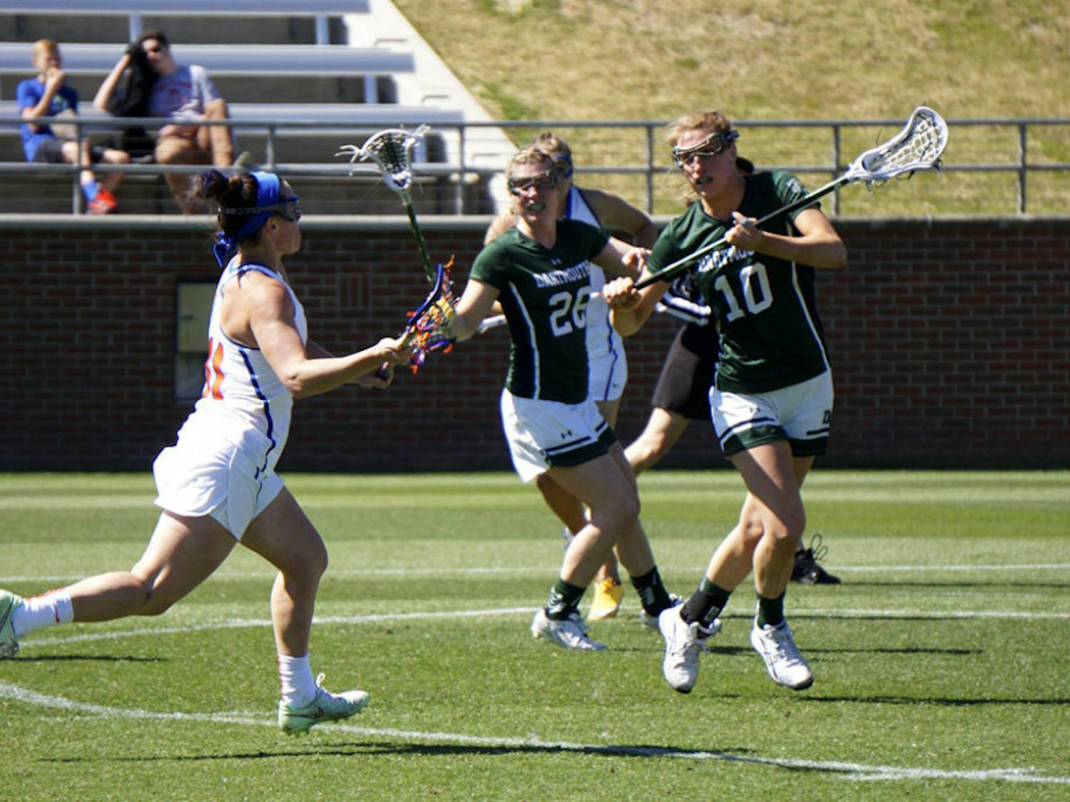 Caroline Fitzgerald runs toward the net during Florida's 16-6 win over Dartmouth on Feb. 27, 2016, at Donald R. Dizney Stadium.