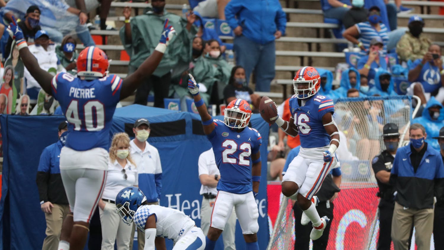 Tre’Vez Johnson (16), Jesiah Pierre (40) and Rashad Torrence II (22) celebrate in the Gators game against Kentucky in The Swamp on Nov. 28.