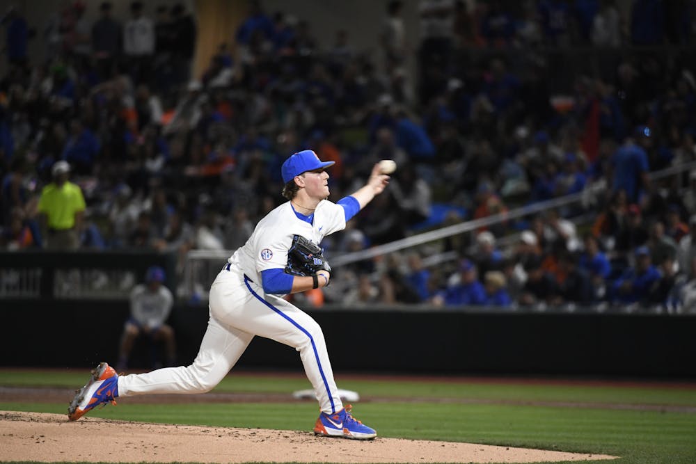Gators baseball left-handed pitcher Cade Fisher throws the ball in Florida's 9-5 loss to St. John's University on Friday, February 16, 2024. 