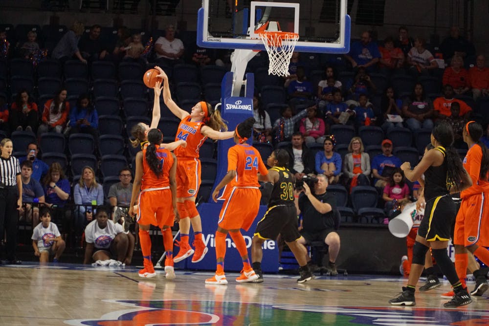 Haley Lorenzen blocks a shot during Florida's win against Southeastern Louisiana on Dec. 28, 2016 in the Exactech Arena. 