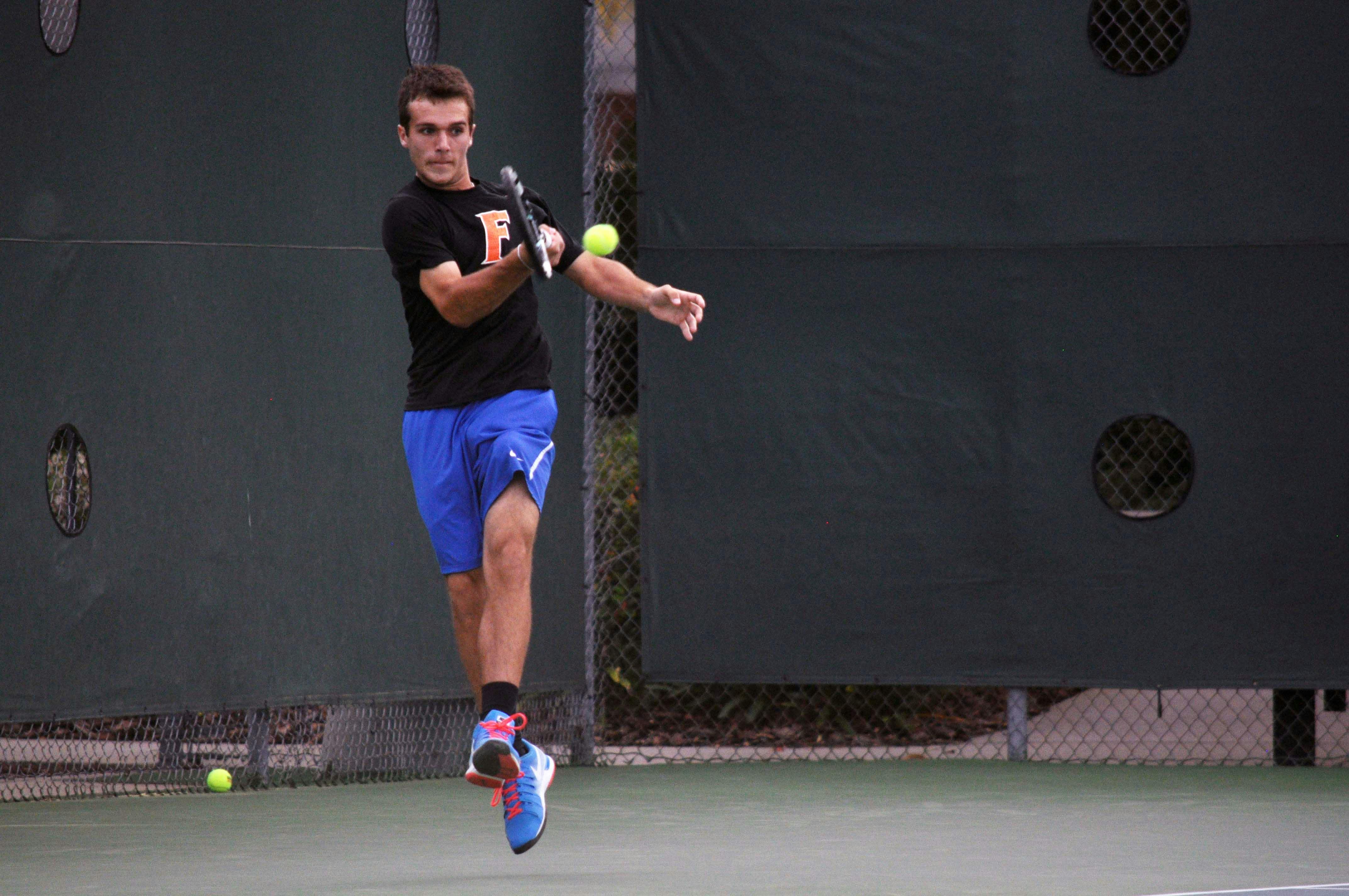 Chase Perez-Blanco returns a ball during Florida's 4-1 win against Mississippi State on March 13 at the Ring Tennis Complex.