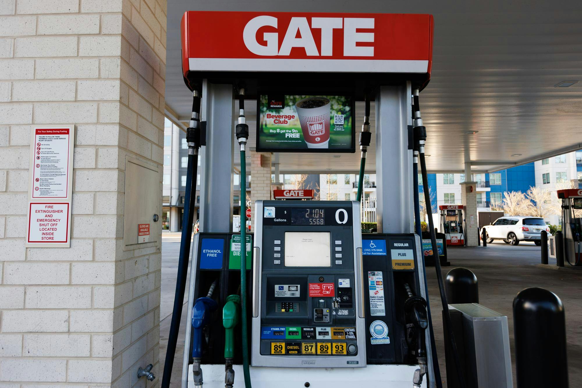 A gas pump displays current gas prices at a Gate gas station on Friday, March 13, 2026, in Gainesville, Fla.