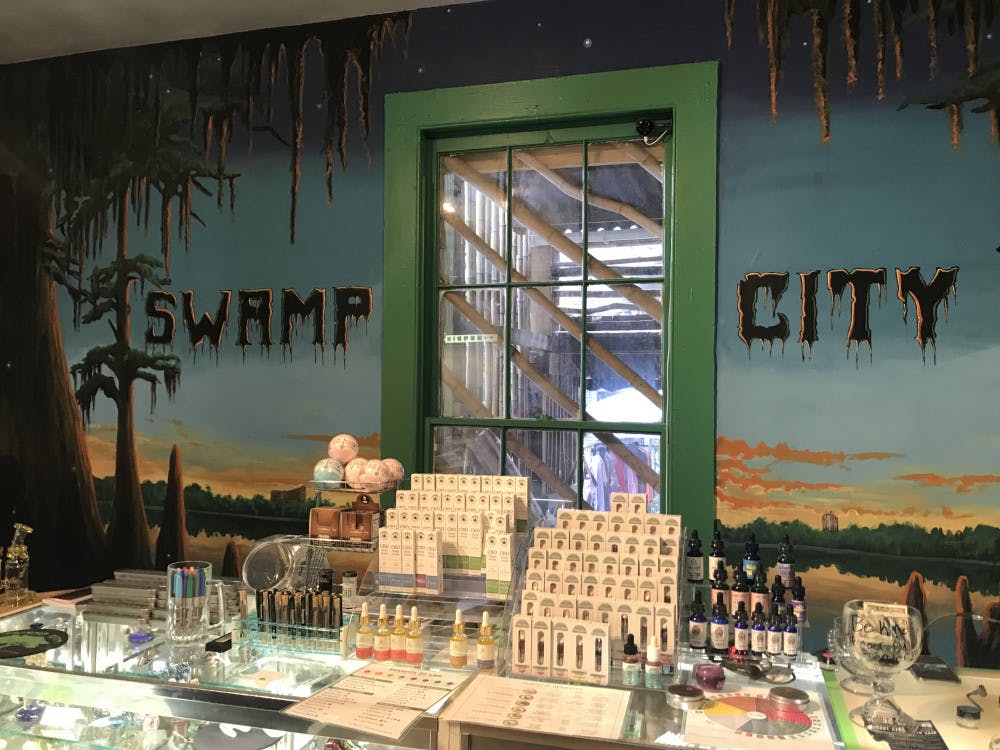 <p>Swamp City Gallery Lounge, which offers CBD products and craft beer, opened on Saturday.</p>