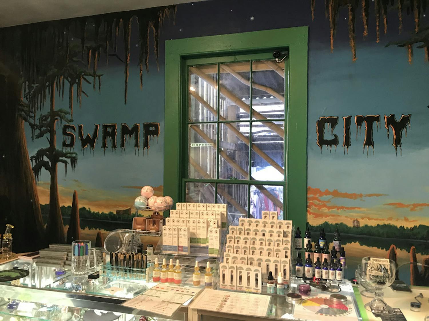 Swamp City Gallery Lounge, which offers CBD products and craft beer, opened on Saturday.