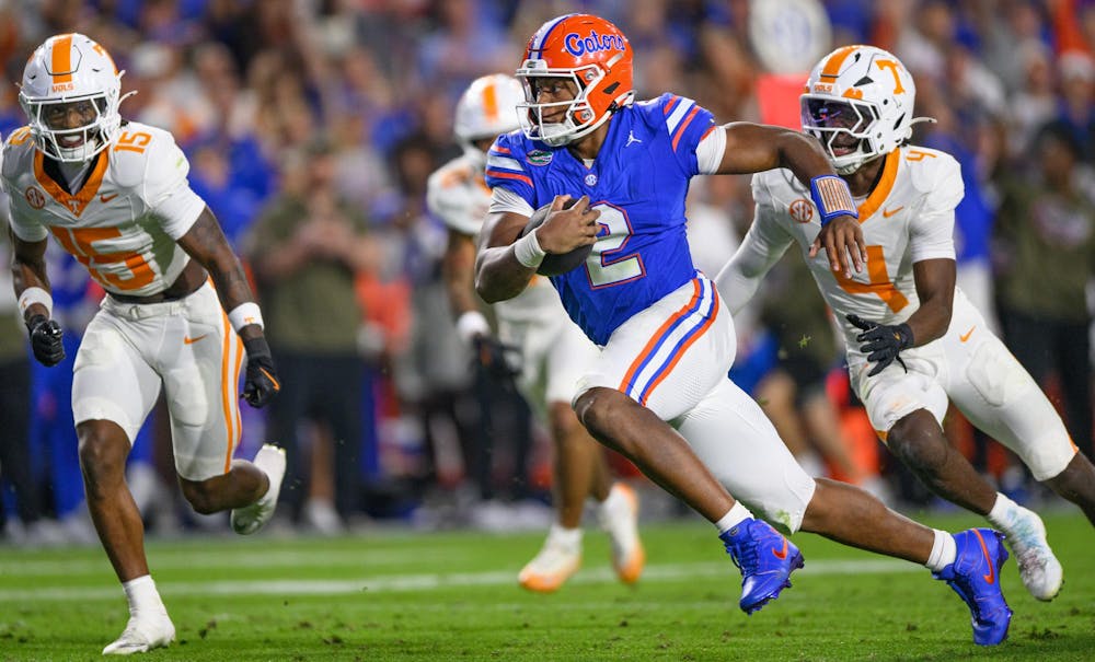 Florida quarterback DJ Lagway (2) run during the first half of an NCAA college football game, Saturday, Nov. 22, 2025, in Gainesville, Fla.
