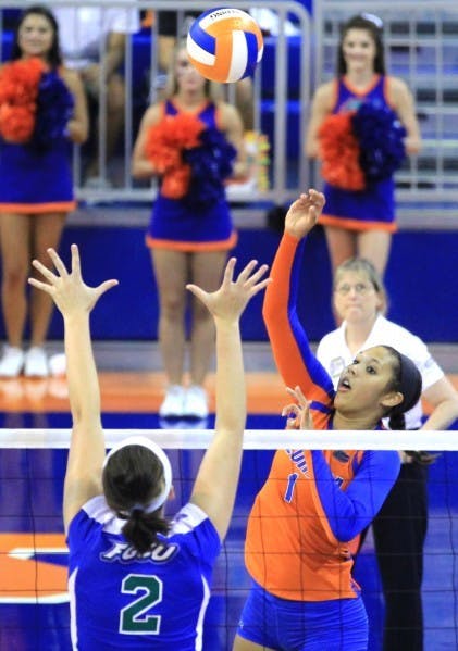 Freshman Berkley Whaley sends the ball over the net during Florida’s 3-0 win against FGCU on Aug. 25 in the O’Connell Center.