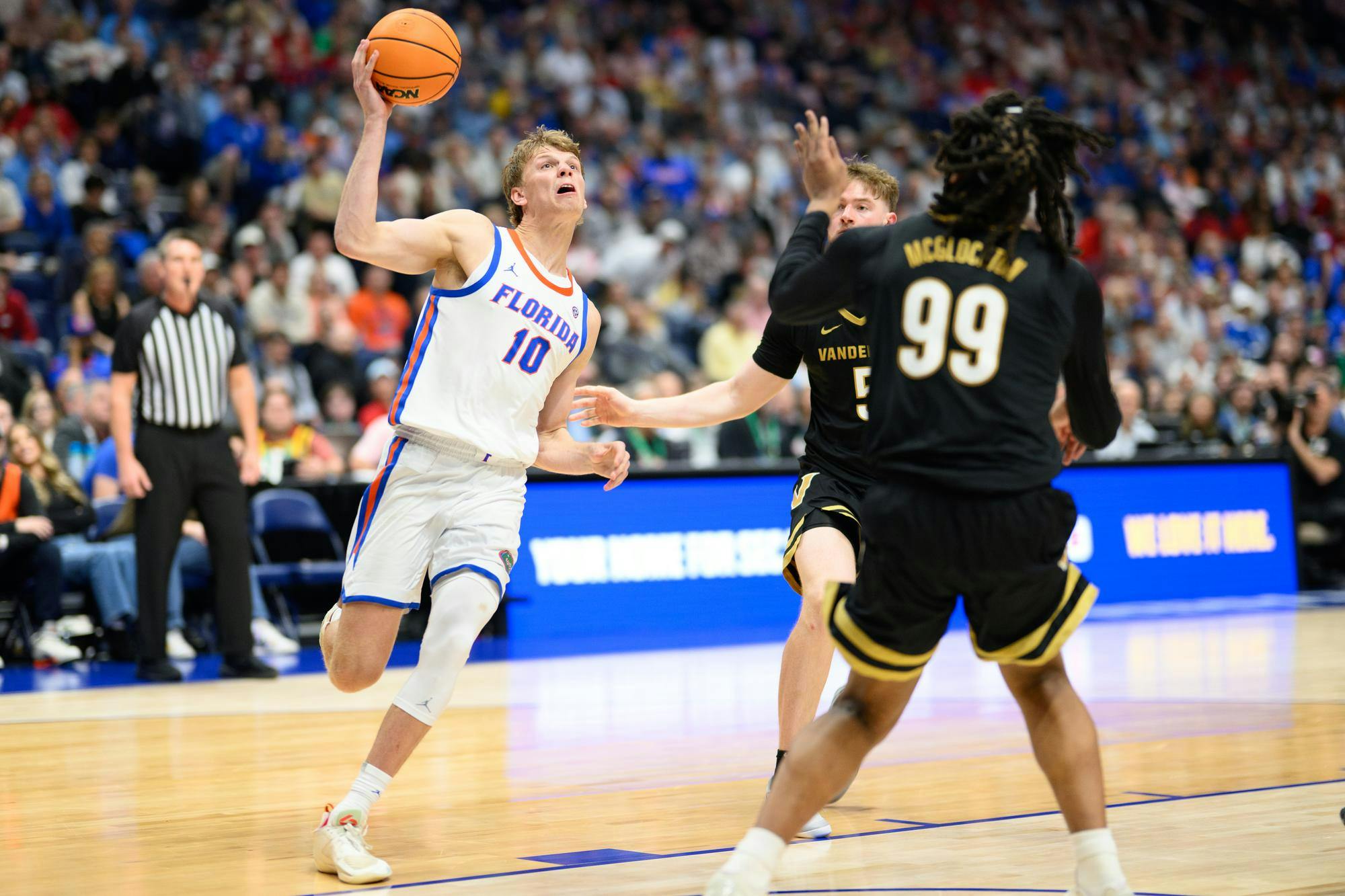 Florida forward Thomas Haugh (10) drives during the second half of an SEC Men's Basketball Tournament semifinal game against Vanderbilt, Saturday, March 14, 2026, in Nashville, Tenn.