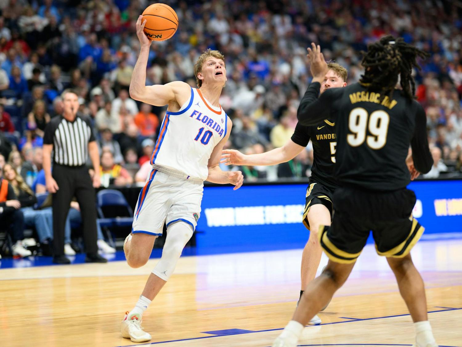 Florida forward Thomas Haugh (10) drives during the second half of an SEC Men's Basketball Tournament semifinal game against Vanderbilt, Saturday, March 14, 2026, in Nashville, Tenn.