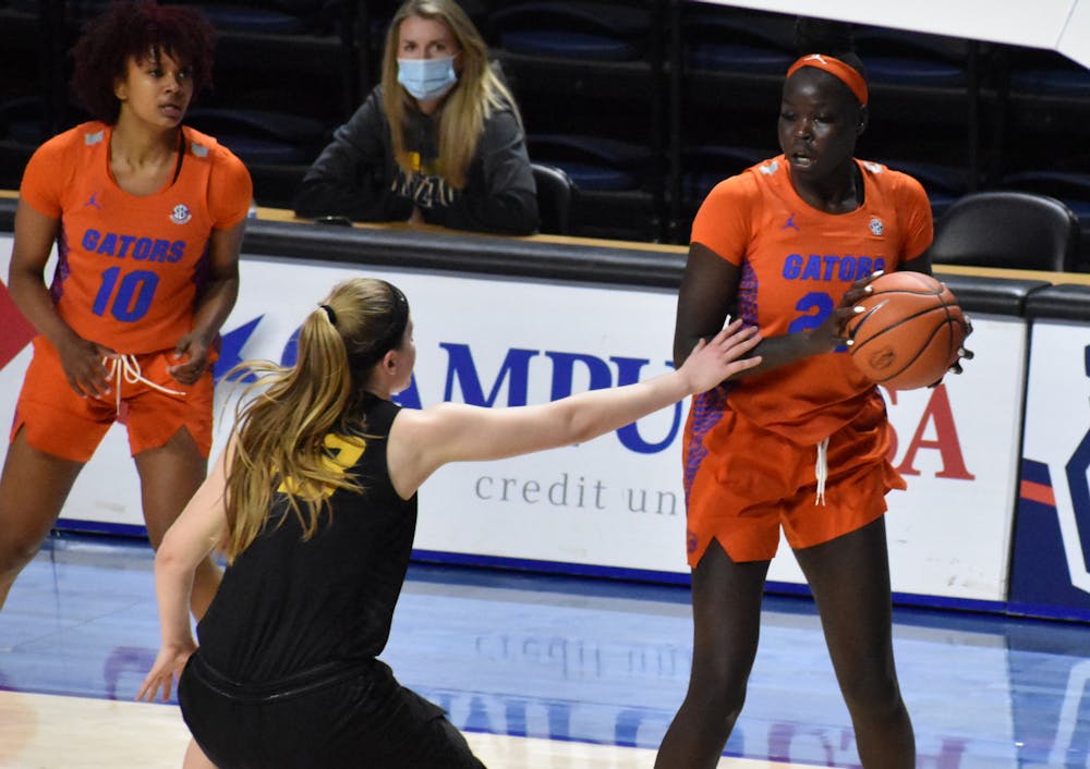 <p>Florida forward Faith Dut sizes up a Missouri defender on Feb. 11, 2021. Dut scored 12 points and grabbed five rebounds in just 22 minutes Thursday as the Gators fell by 18 against Ole Miss. </p><p></p>