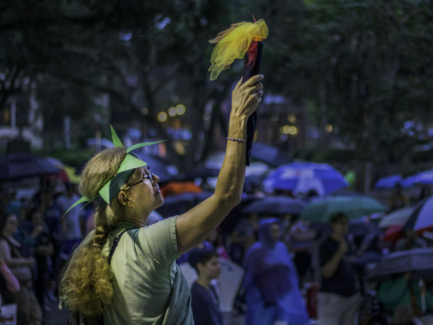 About 100 people gathered in front of Gainesville City Hall on Friday evening to protest the conditions in immigration detention centers. The protest, Lights for Liberty: A Vigil to End Human Detention Camps, was one of more than 500 around the world. It was organized by North Central Florida Indivisible and other local activist groups and featured several speakers who urged the crowd to help the undocumented community in Gainesville and call members of the U.S. Congress to demand the camps be closed down, including the center located in Homestead, Florida. The event also had local children recite poems that were left behind by children in Theresienstadt, a ghetto and concentration camp built by the Nazis during the Holocaust.
