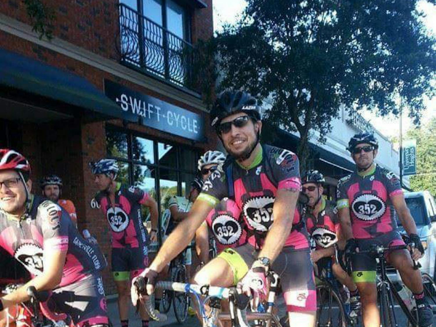Bicyclists ride along West University Avenue as part of the Gainesville-Atlantic 75 bicycle race in September 2015.