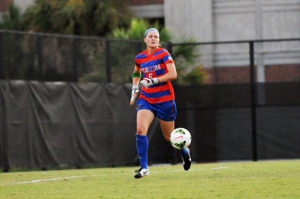 Goalkeeper Val Tysinger chases the ball during Florida's 2-1 win against Troy in an exhibition match on Aug. 11, 2015, at the soccer practice field at Donald R. Dizney Stadium.