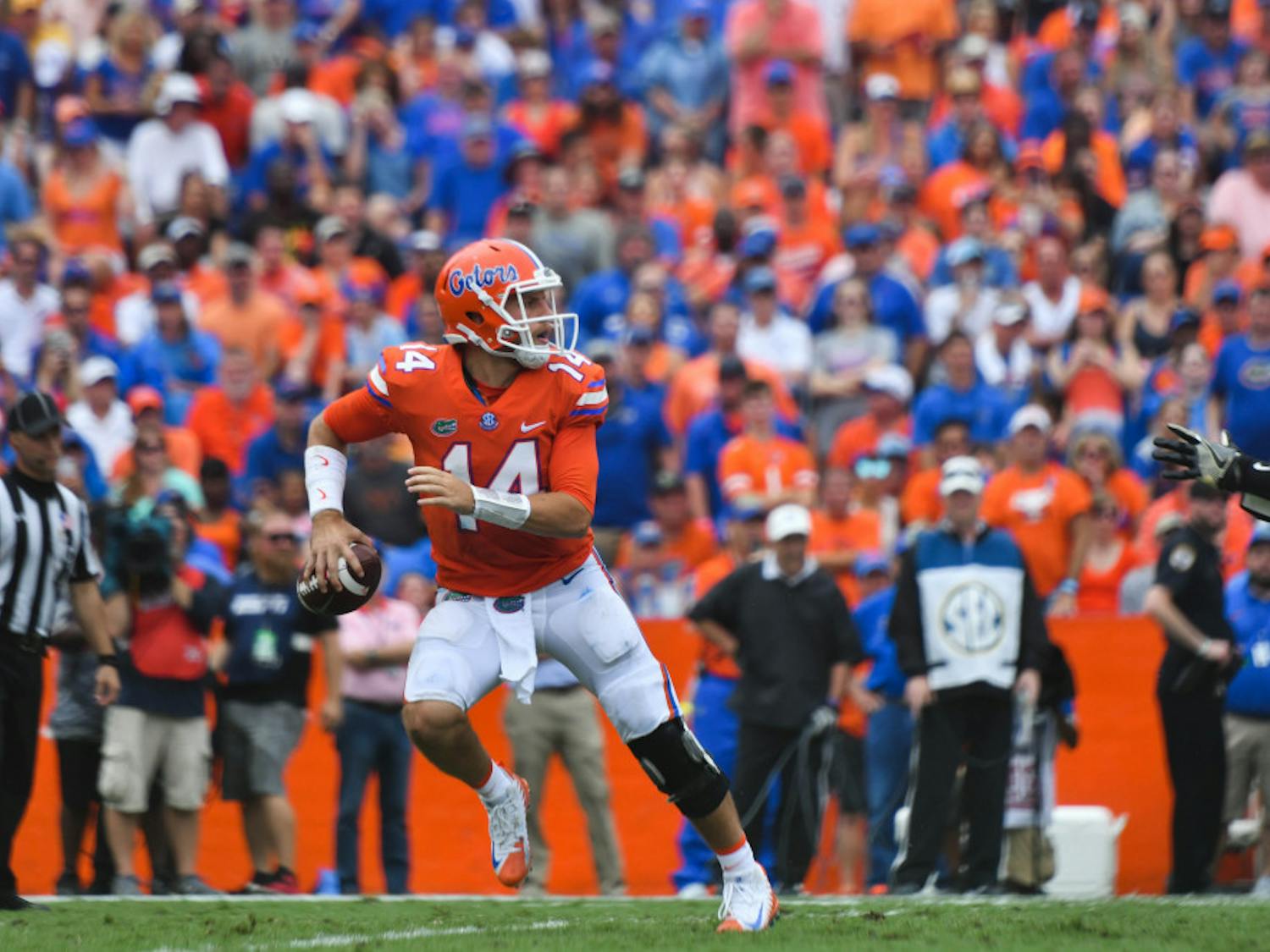 UF quarterback Luke Del Rio scrambles during Florida's 38-24 win against Vanderbilt on Saturday at Ben Hill Griffin Stadium.