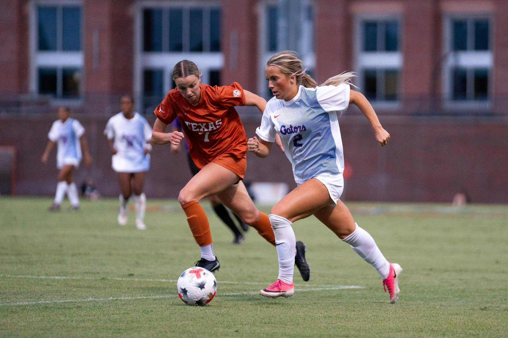 Florida's Ella Peterson races a Texas defender to the ball during the Gators' match against the Longhorns in Gainesville, Fla. Thursday, Sept. 24.